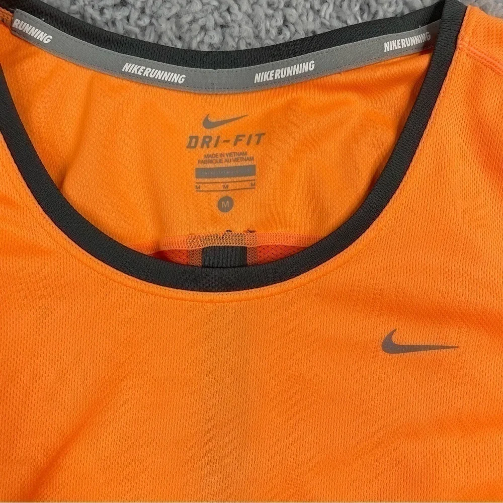 Nike Top Womens Medium Running Shirt Bright Neon Orange Night Run Active Track